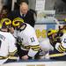 Michigan head coach Red Berenson speaks to players while on the bench in the first period at Yost Arena on Friday night. Melanie Maxwell I AnnArbor.com